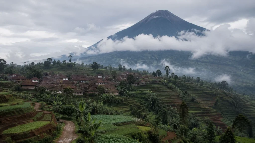 Kaliurang Yogyakarta highland landscape with volcanic Merapi slopes and village fields at morning light