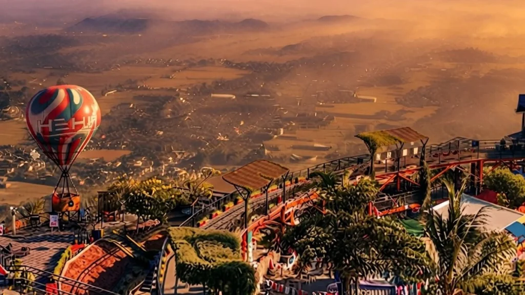 HeHa Sky View terrace overlooking hills and coastline at sunset