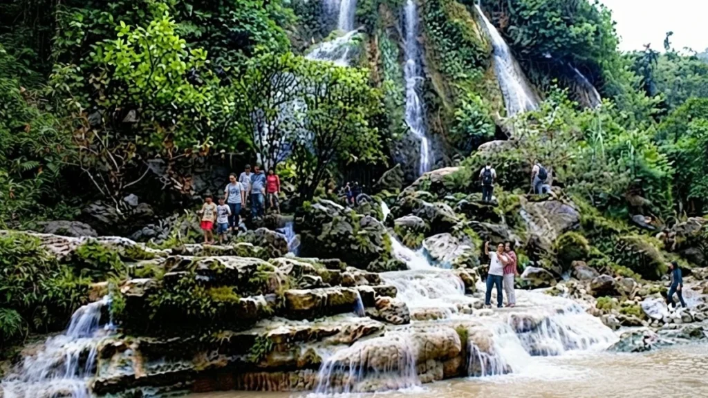 Boat carrying visitors along the Oyo River toward Sri Gethuk Waterfall